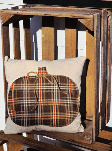 Quilted Pumpkin Pillow on vintage grain sack